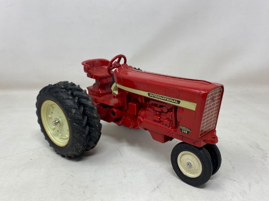 Ertl Red International Farmall 544 Metal Tractor with Rubber Tires