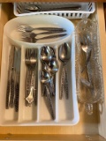 Flatware in Divided Storage Containers
