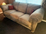 Three-Cushion Leather Sofa with Rolled Arms and 2 Throw Pillows