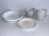 4 White Corelle Plates and Bowl and 7 White Bowls