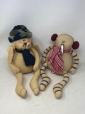 Stuffed Dog in Camo Hat and Stuffed Snowman with Ear Muffs and Scarf