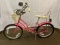 Girl's Pink Schwinn Vintage Bike with Flowered Banana Seat and Wicker Basket