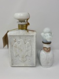 2 Liquor Bottles- One with Embossed Eagle, Other is Poodle