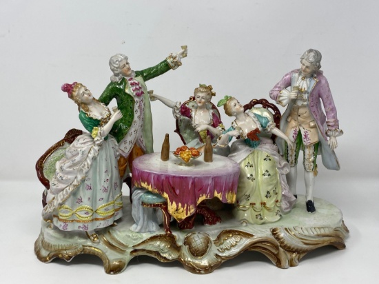 Porcelain Figural Grouping- People Toasting Around a Table