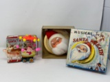 Santa on Sleigh Wind-Up Toy with Original Box and Musical Santa Wreath with Original Box