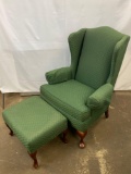 Green Upholstered Wingback Chair with Matching Foot Stool