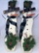 2 Wooden Snowman Decorations- Each with Light Bulbs on Hat and Greens at Base