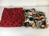 2 Large Pieces of Fleece Fabric- Red with Paw Prints and Dogs in Santa Hats