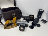 Vintage 35 mm Canon FTb Camera with Lenses, Flashes, Strap and Case