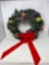 Wreath with Artificial Greens, Frosted Fruit and Red Bow