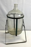 Clear Glass Bottle in Wrought Iron Stand