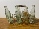 4 Vintage Coca-Cola Bottles in Wire Carrier