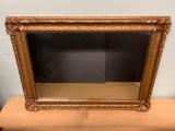 Wooden guilt framed mirror