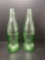 2 Green Coca-Cola Bottles