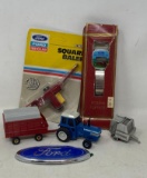 Ford TW-35 Die Cast Tractor with Wagon & Baler, Ford New Holland Wrist Watch and Ford Emblem