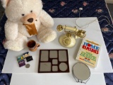 Stuffed Teddy Bear, Magnifying Mirror, Wooden Mug, Telephone, Frame,. Matchbooks