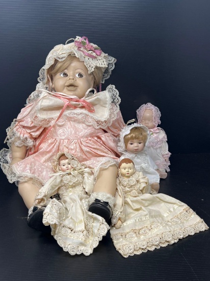 5 Baby Dolls- One Large, 4 Small