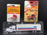 Ertl Die Cast Implement Baler, Ertl Pow-R-Pull Tractor and Ford New Holland Tractor Trailer
