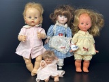 3 Vinyl Dolls and One Porcelain Doll