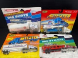 4 Die Cast Trucks- Ant Eater MIssile Carrier and Road Champs Car Carrier & Tractor Trailer
