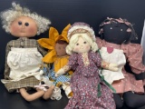 4 Various Cloth Dolls