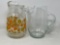 2 Glass Pitchers- One Has Floral Design