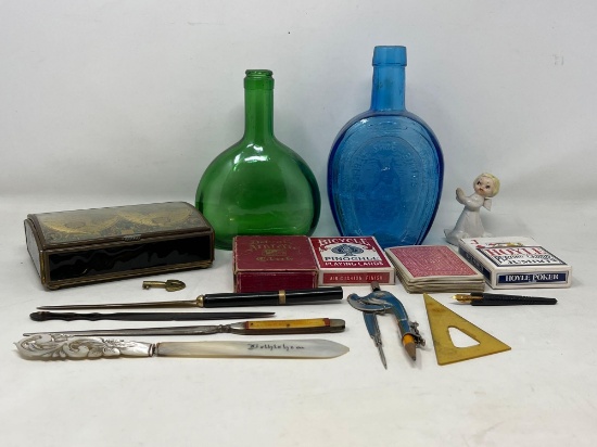 Colored Glass Bottles, Playing Cards, Protractor, Lacquered Box, Letter Openers, Fountain Pen, Angel