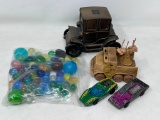 Marbles, Metal Car Bank, Artillery Vehicle and 2 Red Line Matchbox Cars