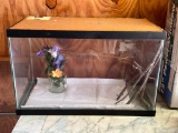 Aquarium with Artificial Flowers and Twigs