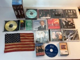 VHS Tapes, CDs, Cassette Tapes and American Flag
