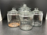 4 Glass Lidded Biscuit Jars