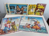 Posters for The Wizard of Oz (2), the Pagemaster and Pagemaster Wrapping Paper and Cereal Box
