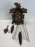Black Forest Cuckoo Clock with Pine Cone Weights and Leaf Pendulum