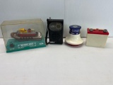Motorific Boat in Display, Black Portable AM/FM Radio, Red/White/Blue Radio and Battery Box Radio