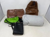 Brown Leather Purse and Backpack, Green Fanny Pack, Black Crossbody Bag and Gray Bolster Pillow