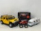 (2) Racing Champions #17 Western Auto (New), Yellow Hummer, Red Monster Truck and White RV