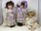 3 Porcelain Dolls- 2 in Purple Outfits and One in Cream Outfit