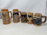 Grouping of 5 Ceramic Beer Steins- 4 Have Figures in Relief, Other is Souvenir from Niagara Falls