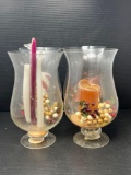 4 Clear Glass Snifter Type Candle Holders with Various Items in Each