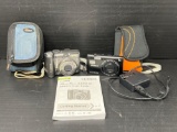 Cameras Lot Including Canon PowerShot A590, Nikon CoolPix, Both with Cases and Canon Instructions