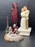 ; Wood Carving, Eiffel Tower Replica, and Metal Cowboys 