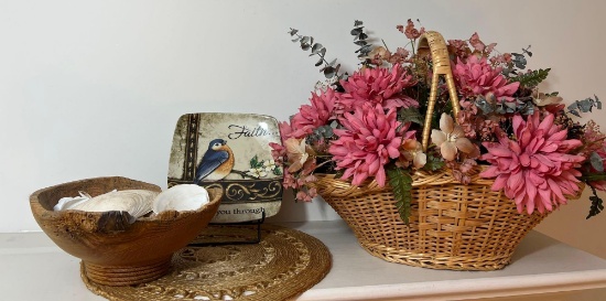 Basket of Artificial Flowers, Burl Wood Bowl with Seashells, Faith Plate on Easel and Wicker Trivet