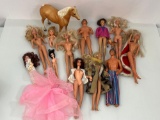 Fashion Dolls in Various States of Dress and Various Sizes and Horse