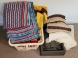 Large Lot of Crocheted Afghans, Woven Throws, Table Linens in a Plastic Wash Basket