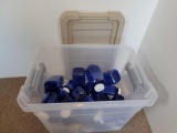 Storage Tote with Blue Plastic Jars and 