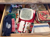 Contents of Drawer- Hot Pads, Kitchen Towels, Oven Mitts, Box of Toothpicks