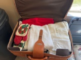 Brown Suitcase with Various Linens- Pot Holders, Oven Mitts, Dresser Scarves, Tablecloths, More