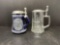 2 Steins with Pewter Lids- One Ceramic with Relief Design and One Etched Clear Glass