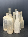 8 Clear Glass Bottles Lot, One has Cork Stopper