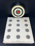 Hanging Bull's Eye Target and Numerous Paper Rifle Targets